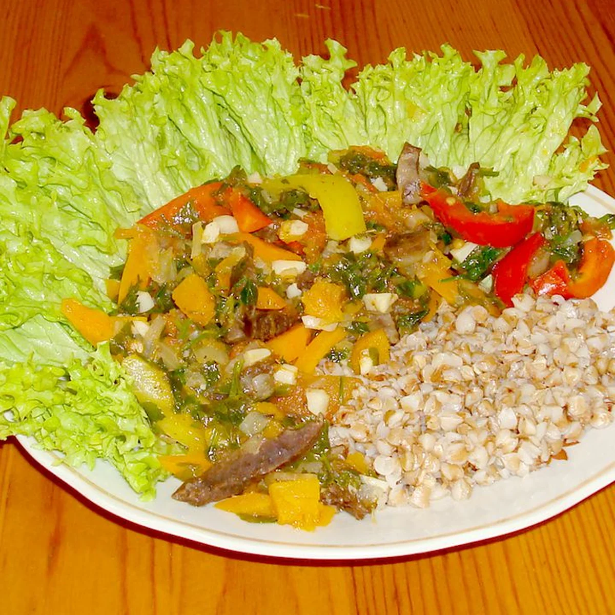 Тушёное свиное сердце с овощами