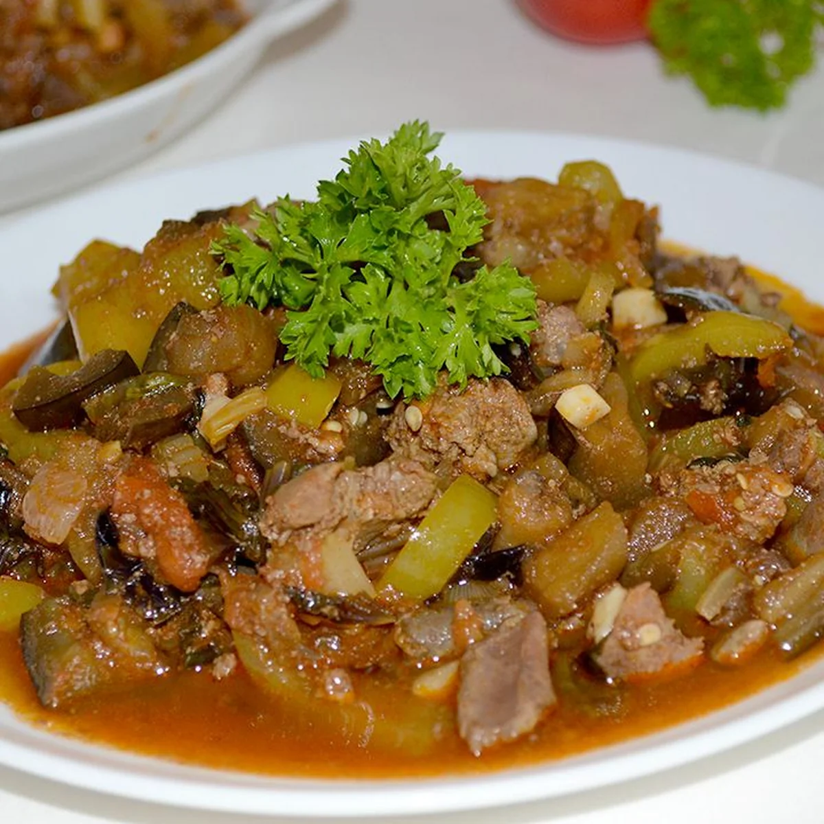 Тушёные субпродукты с овощами